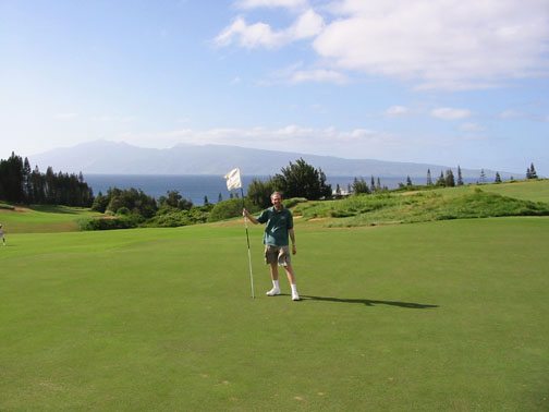Maui golf courses Jon with flag